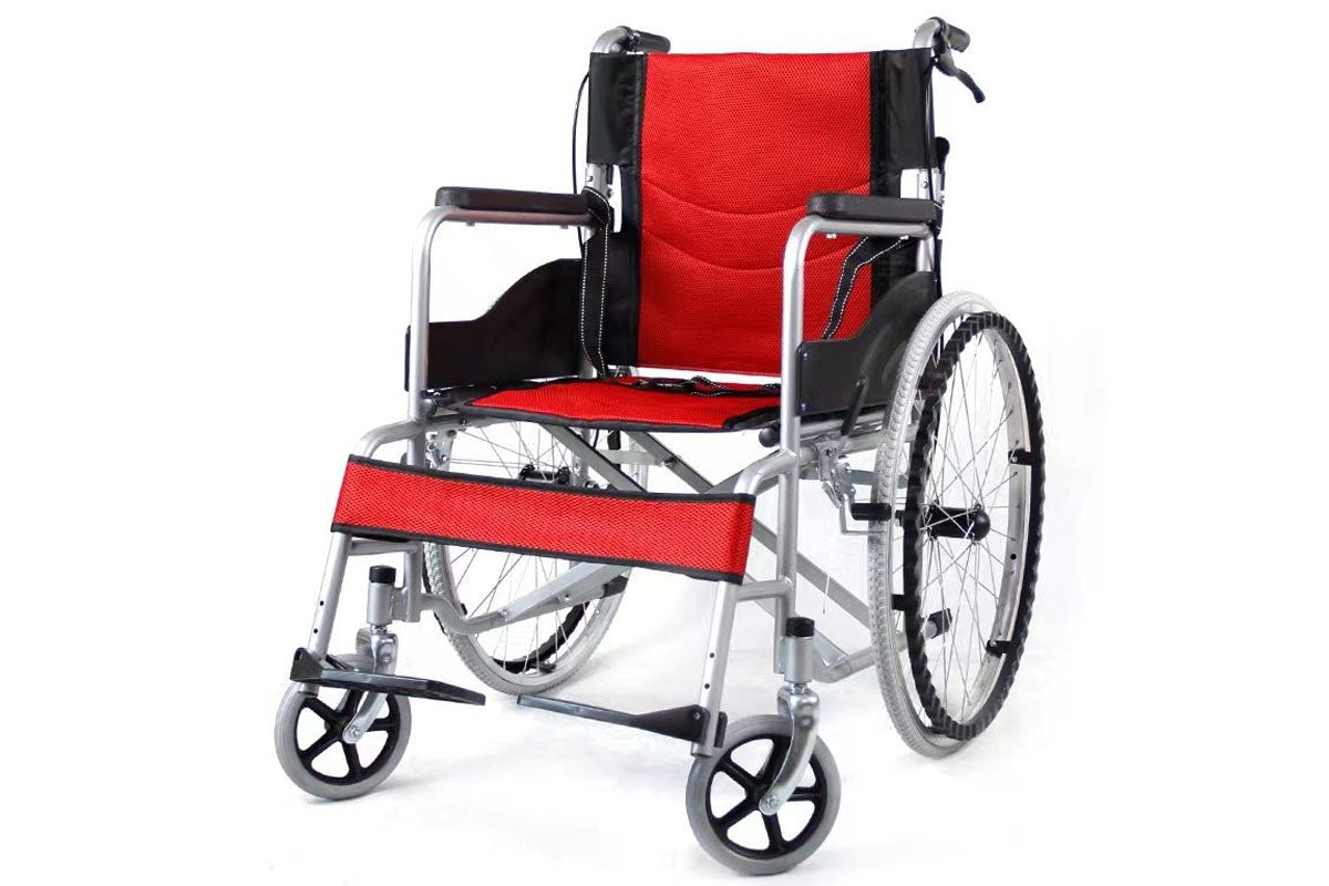Self propelling folding wheelchair